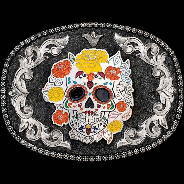 "Our beautiful Santa Maria buckle is crafted with a gorgeous Sugar Skull to pay homage to Vaquero style! This Buckle is built on a matted, German Silver base with an antique finish. It is detailed with a berry edge and German Silver scrolls. 

Cust